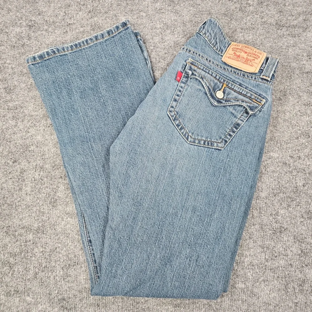 Vintage Levi's 542 Low Rise Flare Jeans Womens 12M Medium Wash Y2K Flap Pocket